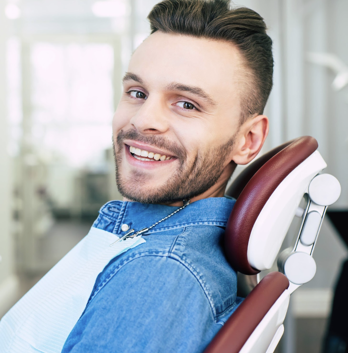 man getting professional teeth whitening in durham
